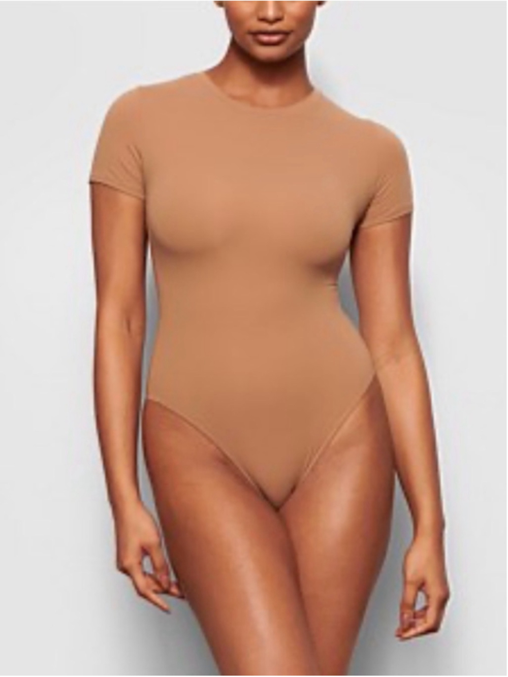 SKIMS Short Sleeve One-Piece Bodysuit in Tan